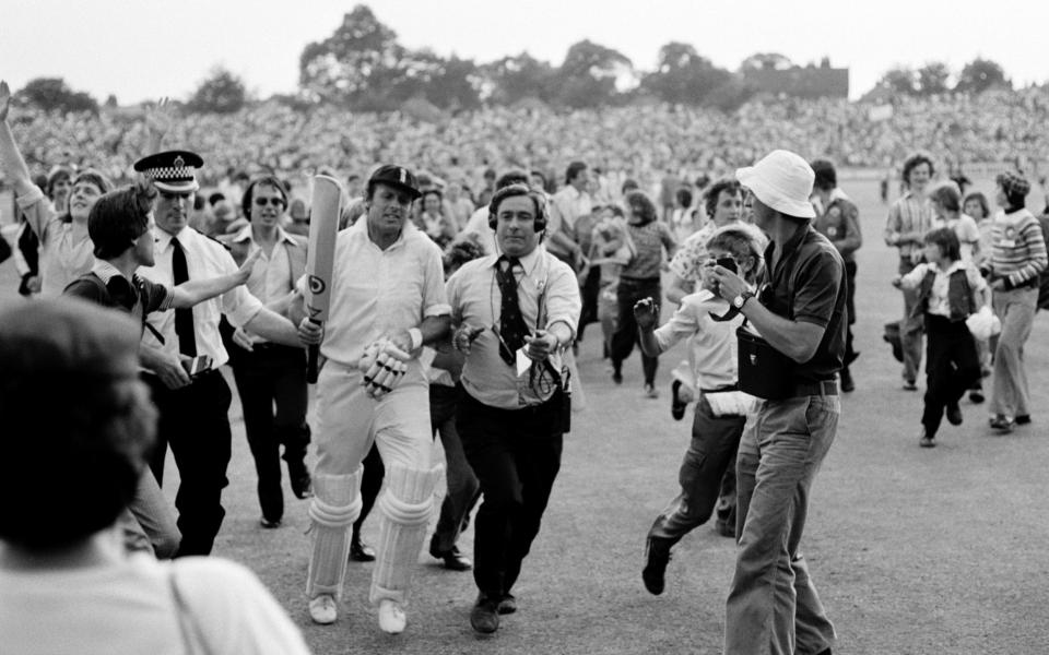 Geoff Boycott leaves the field at the end of play after completing his 100th first class century during the 4th Ashes Test match between England and Australia at Headingley, on 11th August 1977 - Ken Kelly/Popperfoto