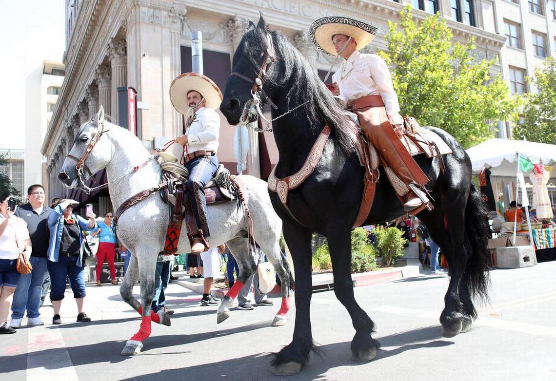 Charros ride their horses at the end of the Sept. 17, 2022 parade that kicked off the Fiestas Patrias celebration in downtown Fresno.