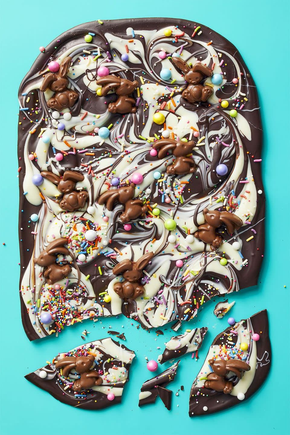 <p>You can top this bittersweet and white chocolate bark base with more than just candy. Switch it up with potato chips, pretzels, or freeze-dried strawberries.</p><p>Get the <strong><a href="https://www.womansday.com/food-recipes/a35681721/bunny-bark-recipe/" rel="nofollow noopener" target="_blank" data-ylk="slk:Bunny Bark recipe.;elm:context_link;itc:0;sec:content-canvas" class="link ">Bunny Bark recipe.</a></strong></p>