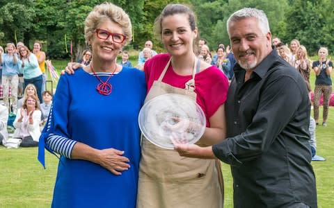 Prue Leith and Paul Hollywood presenting Sophie Faldo with her trophy - Credit: Love Productions/Channel 4