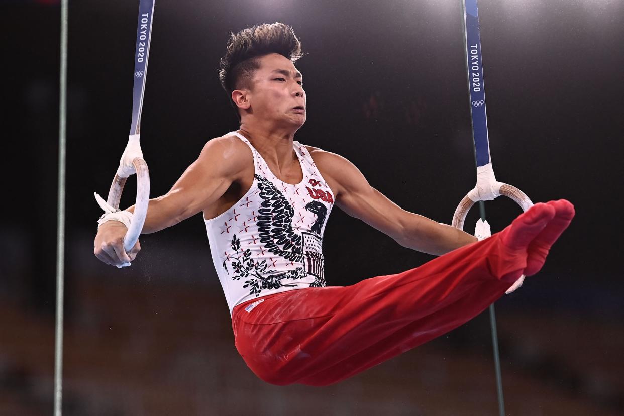 USA's Yul Moldauer competes in the rings event of the artistic gymnastics men's qualification during the Tokyo 2020 Olympic Games at the Ariake Gymnastics Centre in Tokyo on July 24, 2021.
