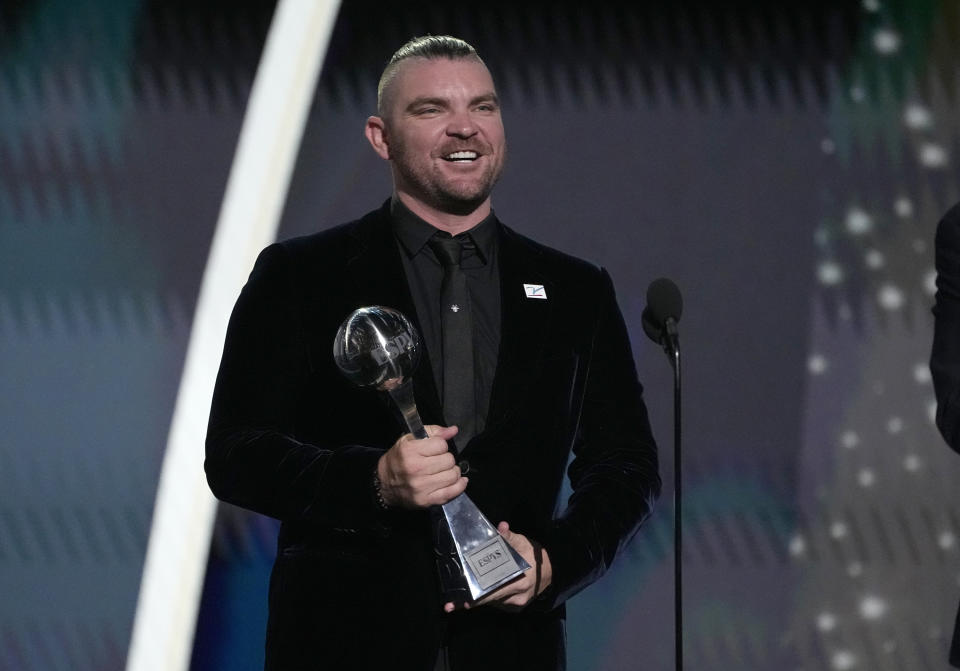 Professional MLB baseball player Liam Hendriks, of the Chicago White Sox, accepts the Jimmy V award for perseverance at the ESPY awards on Wednesday, July 12, 2023, at the Dolby Theatre in Los Angeles. (AP Photo/Mark J. Terrill)