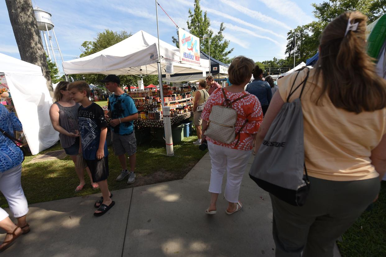 Thousands of people enjoy the N.C. Blueberry Festival in Burgaw, N.C., on Saturday June 15, 2019. This year's festival kicks off Friday, June 14, 2024.