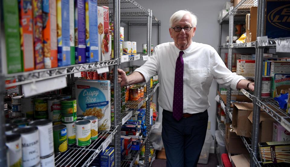 Larry Marsland, CEO of the Lower Cape Outreach Council, inside the facility's food pantry at its Orleans headquarters. Marsland will leave the organization by summer.