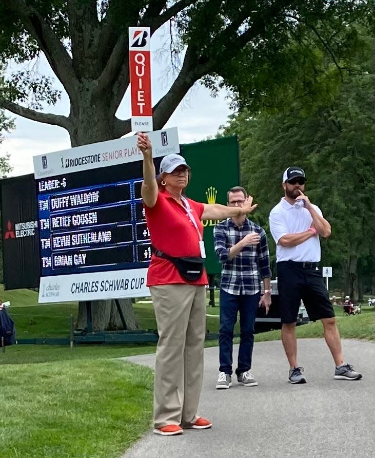 Marilyn Miller Paulk, a member of Tiretown Golf Club, volunteers at the 17th hole at Firestone Country Club on July 8, 2022 during the Bridgestone Senior Players Championship. She is co-chair of the club's fund development committee.