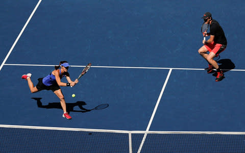 Hingis underlined her status as the world's leading doubles specialist - Credit: AP