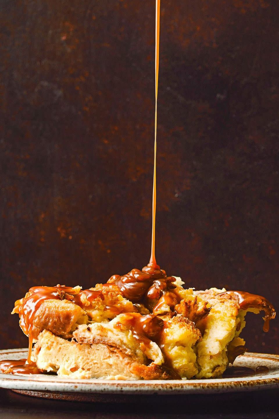 brioche bread pudding with caramel sauce on top