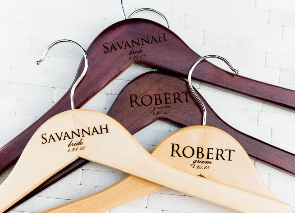 The special day calls for special hangers.<a href="https://fave.co/2FnqMNW" target="_blank" rel="noopener noreferrer"><strong> Get these hangers on Etsy</strong></a>.