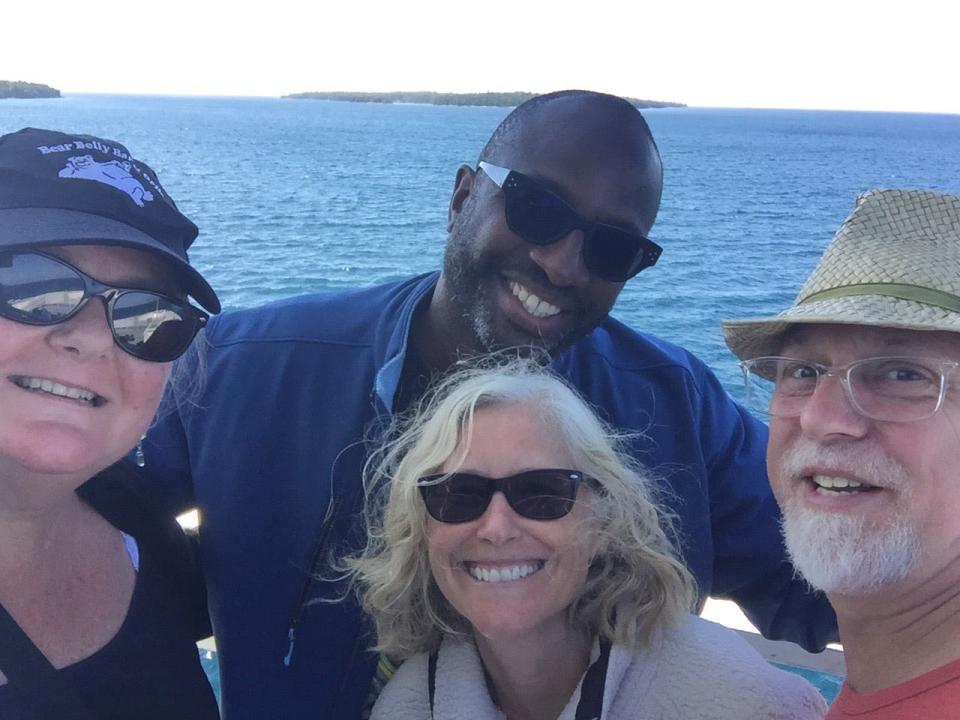 The owners of Idlene, a 50-year-old pontoon boat that continues to motor around Lake Monroe years past her prime. Clockwise are Herb Caldwell, Jon Barnitt, Angela Caldwell and Beth Hamlin.