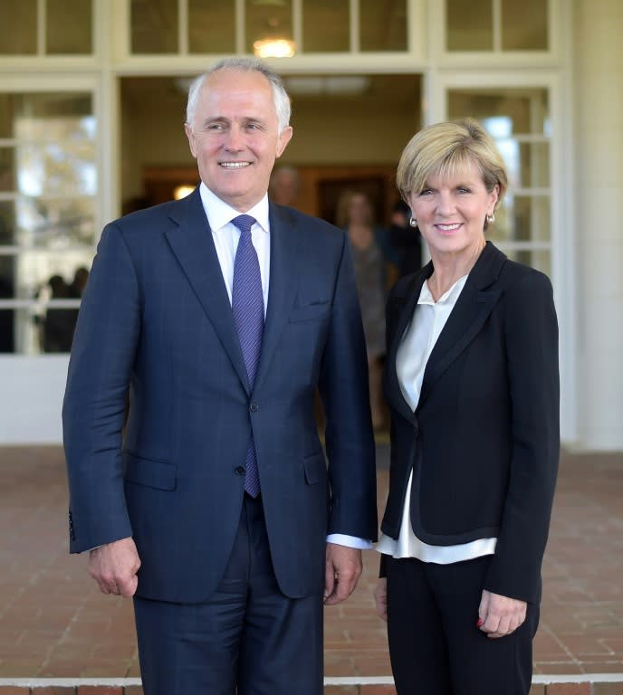 Malcolm Turnbull (L) poses with his deputy leader of the Liberal Party Julie Bishop (R) after being sworn in as Australia's 29th Prime Minister at Government House in Canberra on September 15, 2015