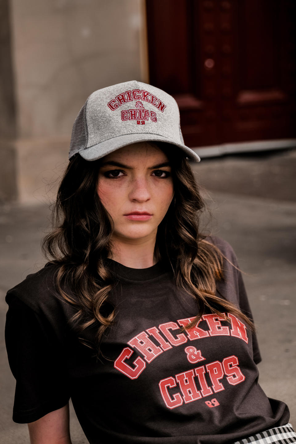 Model in Chicken and Chips Tee and Hat