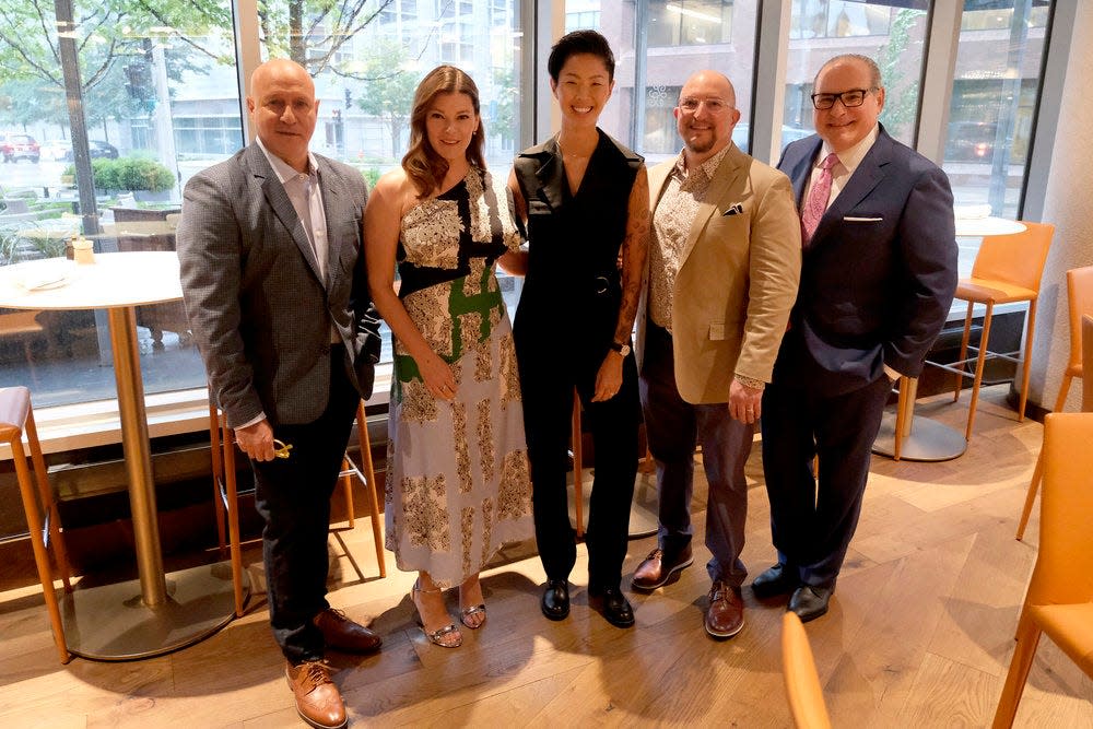 "Top Chef" judge Tom Colicchio, from left, judge Gail Simmons, host Kristen Kish, and guest judges Adam Siegel and Paul Bartolotta stand in Siegel's restaurant, Lupi & Iris, in downtown Milwaukee where the first Elimination Challenge for Season 21 took place.