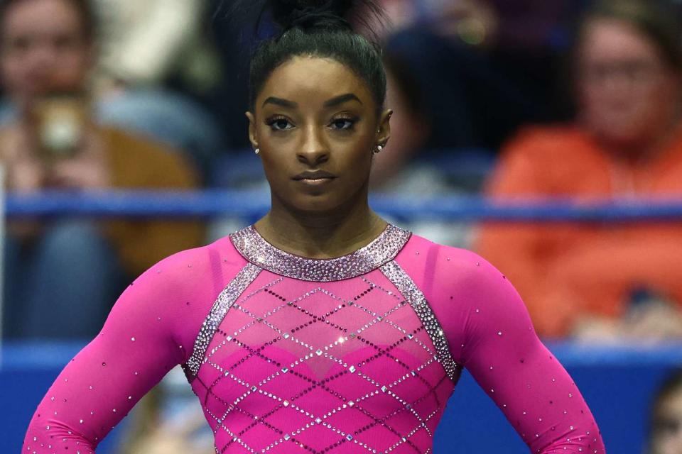 <p>Tim Nwachukwu/Getty </p> Simone Biles competes in the 2024 Core Hydration Classic on May 18, 2024