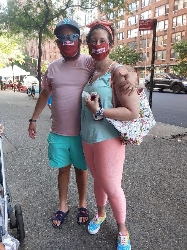 The writer, right, and her husband.