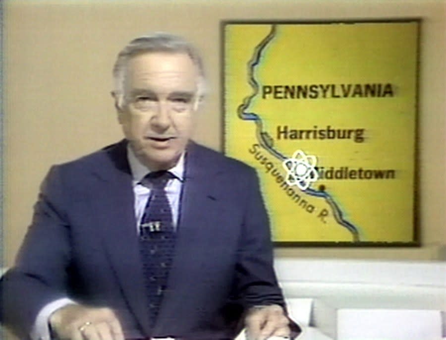 American journalist and TV news broadcaster Walter Cronkite, anchor for the ‘CBS Evening News,’ reports on the meltdown of a reactor at the Three Mile Island nuclear power plant, 1979. Behind the news desk a map shows the scene of the accident with an atomic energy symbol. (Photo by CBS Photo Archive/Getty Images)