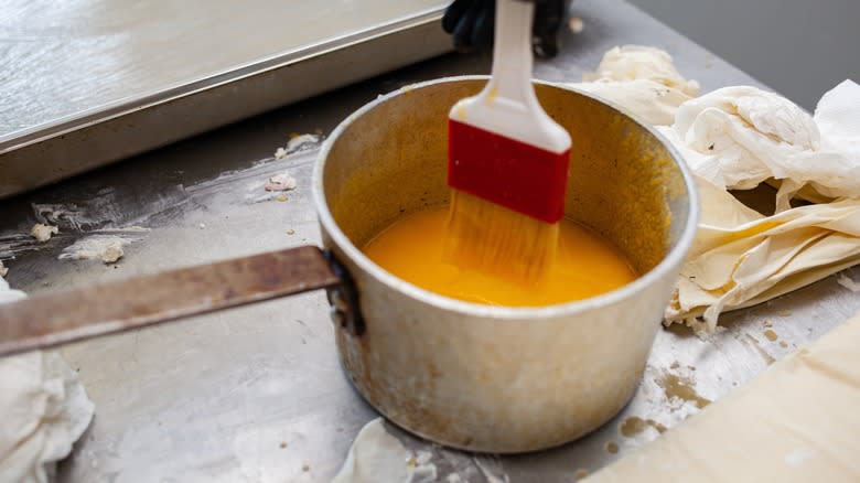 melted butter and a pastry brush