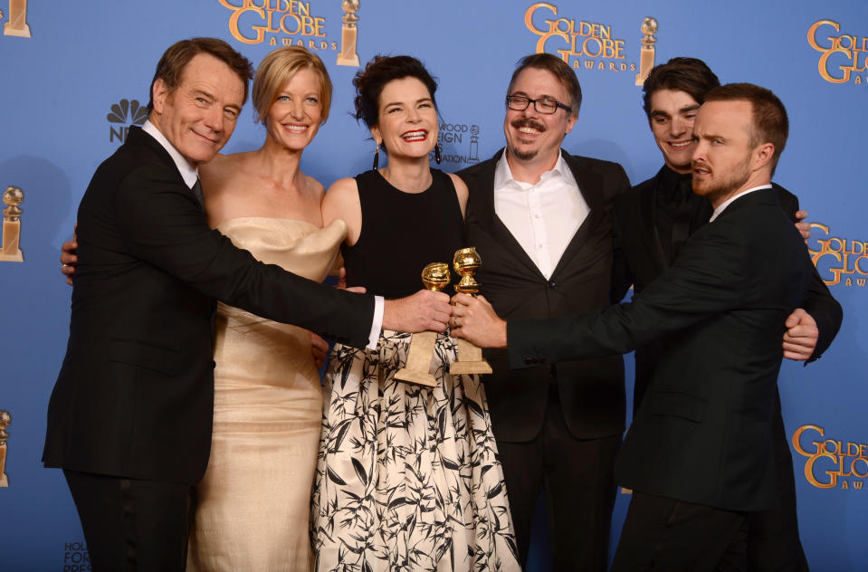 From left, Bryan Cranston, Anna Gunn, Betsy Brandt, show creator Vince Gilligan, RJ Mitte, and Aaron Paul pose in the press room with the award for best TV series - drama for "Breaking Bad" at the 71st annual Golden Globe Awards at the Beverly Hilton Hotel on Sunday, Jan. 12, 2014, in Beverly Hills, Calif. (Photo by Jordan Strauss/Invision/AP)