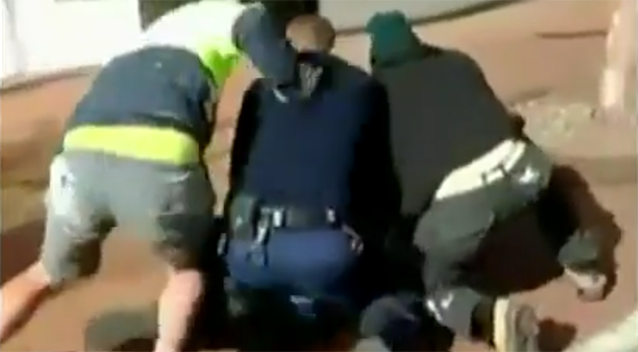 Bystanders wrestled the man to the ground. Source: 7 news