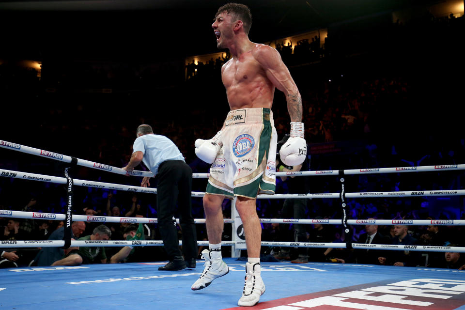 NOTTINGHAM, ENGLAND - MARCH 12: Leigh Wood celebrates after knocking out Michael Conlan during the WBA World Featherweight Title fight between Leigh Wood and Michael Conlan at Motorpoint Arena Nottingham on March 12, 2022 in Nottingham, England. (Photo by Nigel Roddis/Getty Images)