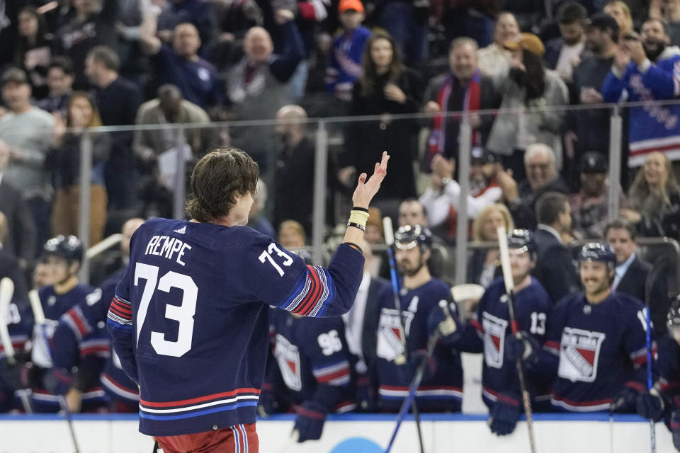 New York Rangers center Matt Rempe (73) gestures at fans as he leaves the ice after fighting New Jersey Devils defenseman Kurtis MacDermid during the first period of an NHL hockey game, Wednesday, April 3, 2024, at Madison Square Garden in New York. (AP Photo/Mary Altaffer)