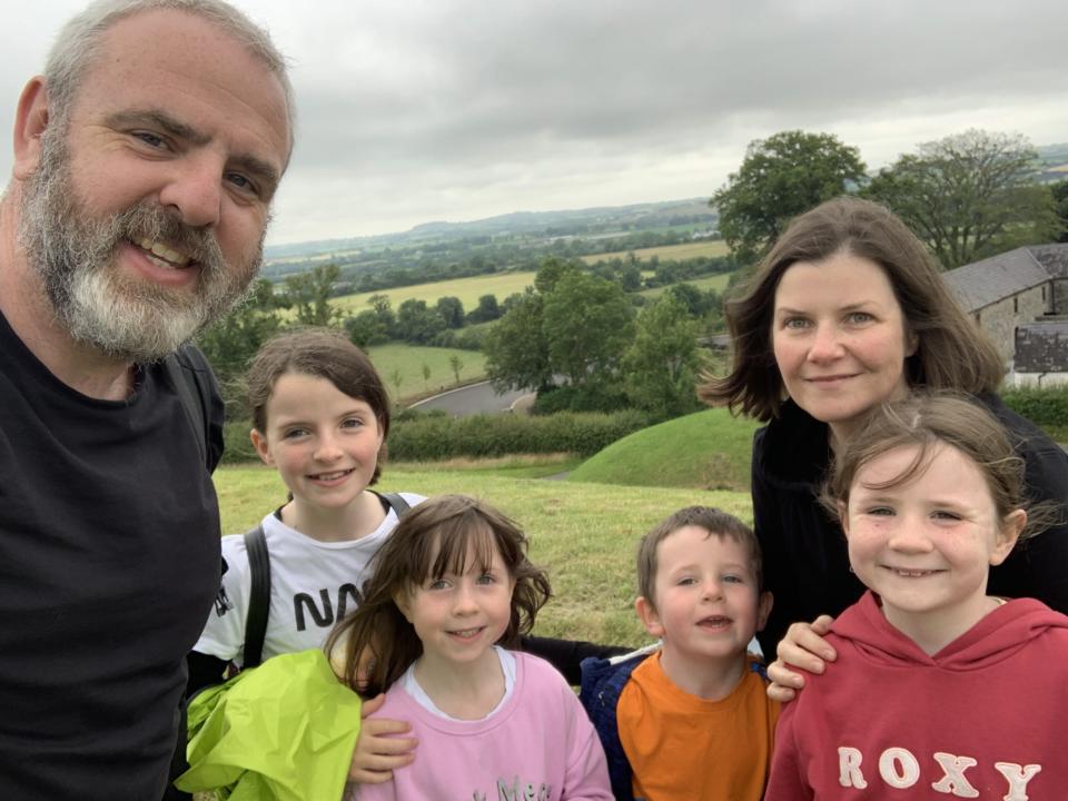 Dave Bolgar in a selfie photo in the Irish countryside with his wife and three daughters and son. 