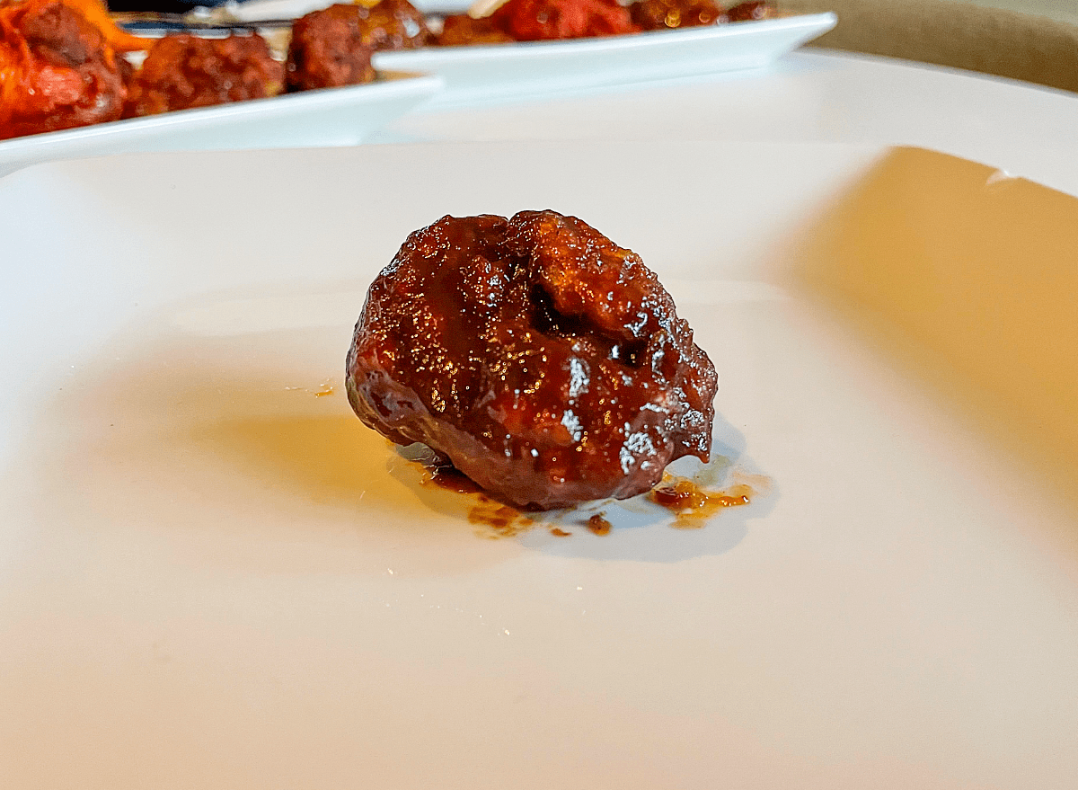 a bbq boneless wing on a plate. 