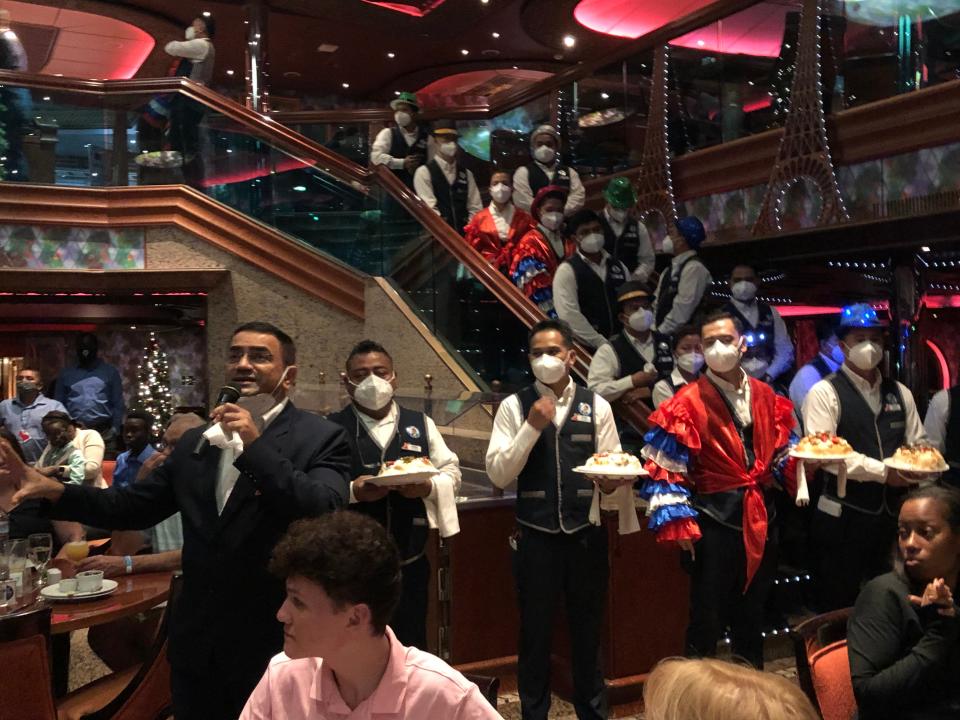 Crew members are masked on Carnival ships.