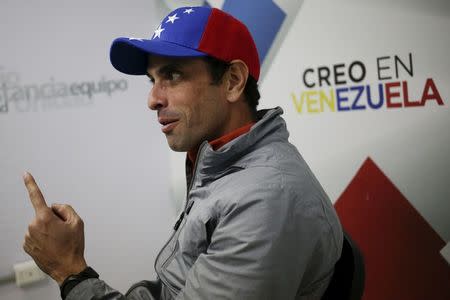 Venezuelan opposition leader and Governor of Miranda state Henrique Capriles speaks during an interview with Reuters in Caracas January 28, 2016. REUTERS/Marco Bello