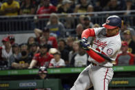 Washington Nationals' Juan Soto (22) hits an RBI single in the fifth inning of a baseball game against the Pittsburgh Pirates, Saturday, Sept. 11, 2021, in Pittsburgh. (AP Photo/Rebecca Droke)