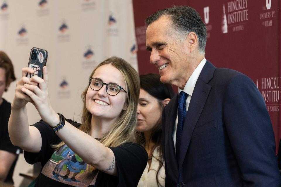 A student takes a selfie with Utah Sen. Mitt Romney at the Sutherland Institute’s 2023 Congressional Series.