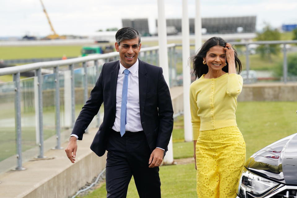 Rishi Sunak and his wife, Akshata Murty, arrive for the launch of the Conservative Party manifesto. (PA)