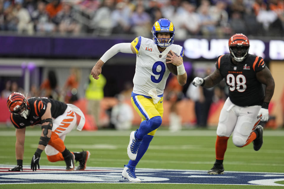 Los Angeles Rams quarterback Matthew Stafford (9) runs against the Cincinnati Bengals during the first half of the NFL Super Bowl 56 football game Sunday, Feb. 13, 2022, in Inglewood, Calif. (AP Photo/Marcio Jose Sanchez)