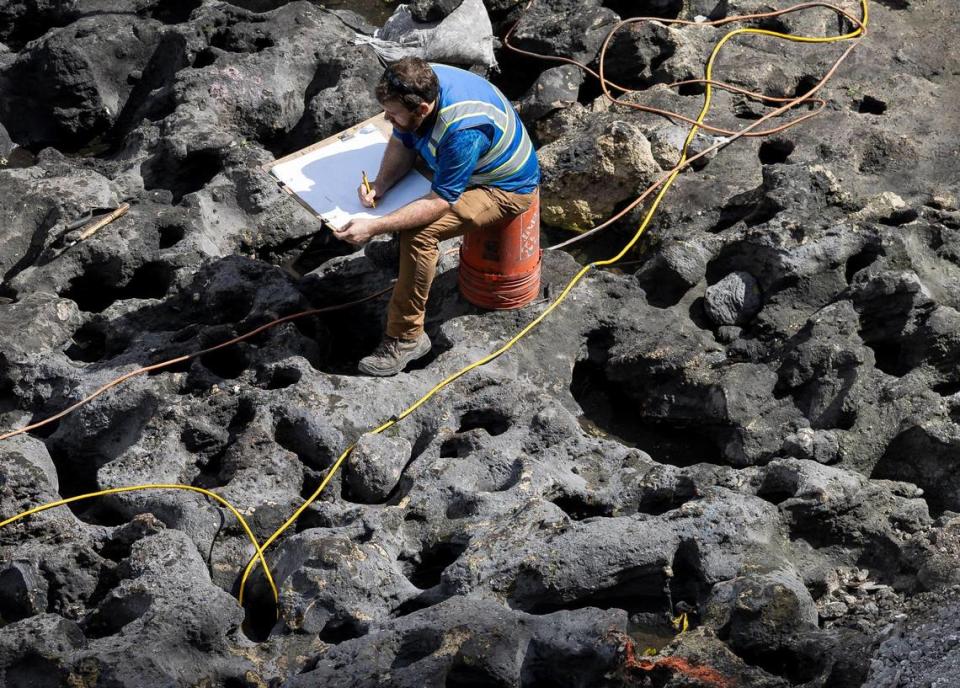 The uneven limestone bedrock at the site is marked by natural sinkholes and round postholes, believed to have been carved by Tequesta people more than 2,000 years ago, that formed the foundation for houses, elevated walkways and other structures.