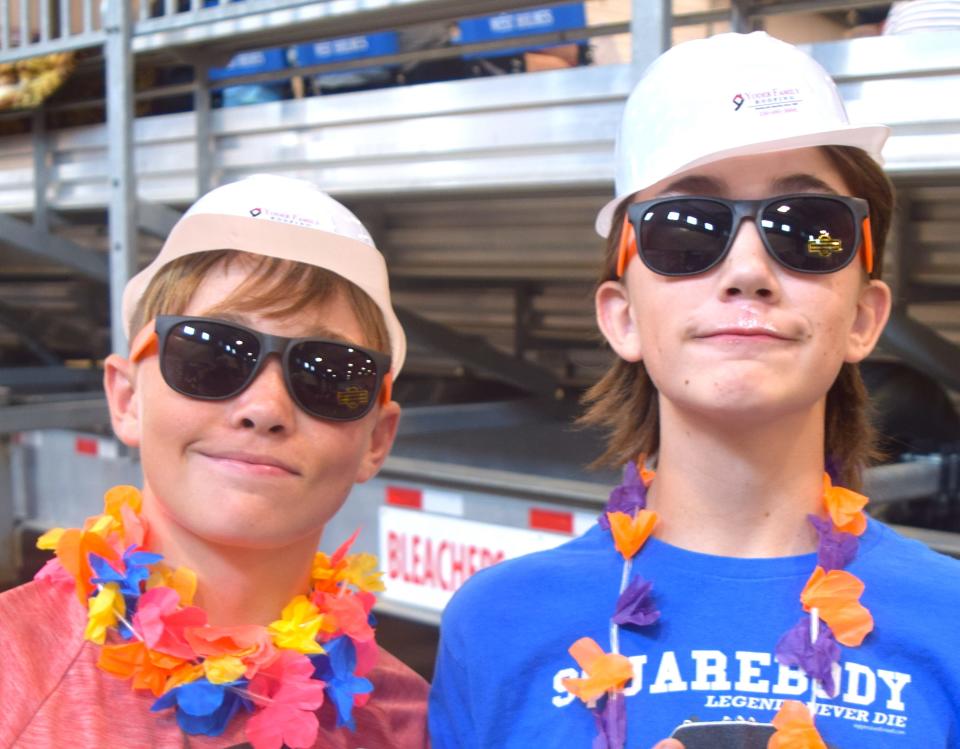 Logan Leyda and Owen Schmucker like showing their pigs best