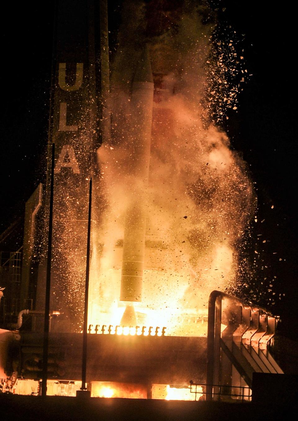 Ice crystals that formed as the Vulcan was loaded with fuel are hurled from the rocket as it lifts off Monday morning from Cape Canaveral Space Force Station.