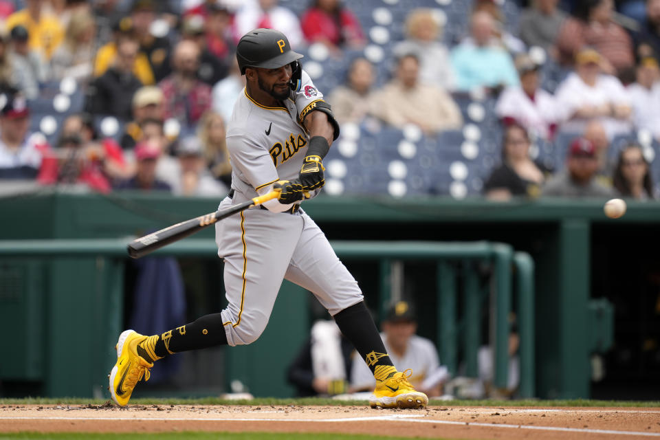 Pittsburgh Pirates' Miguel Andujar singles in the second inning of the first baseball game of a doubleheader against the Washington Nationals, Saturday, April 29, 2023, in Washington. Connor Joe scored on the play. (AP Photo/Patrick Semansky)