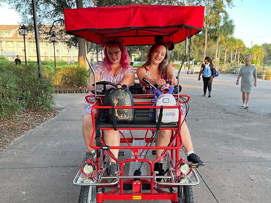 Author and her sister on the red surrey bike.