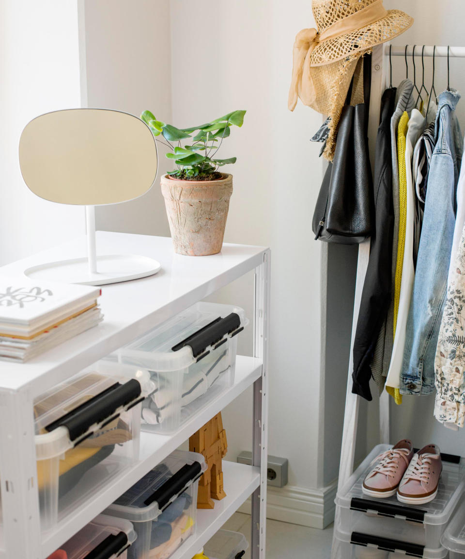 8. Combine freestanding storage units to create a walk-in closet area