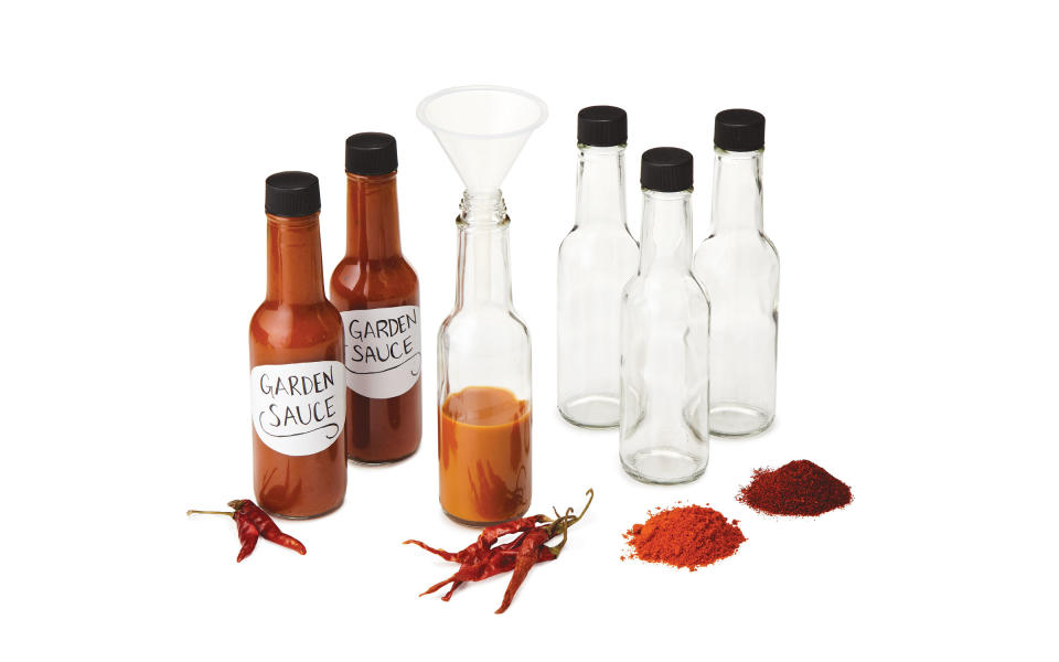 <p>This kit will make six custom bottles of hot sauce using various spices (curry, ancho, cayenne, chili), vinegars, and brown sugar.</p> <p>To buy: <a rel="nofollow noopener" href="http://click.linksynergy.com/fs-bin/click?id=93xLBvPhAeE&subid=0&offerid=399947.1&type=10&tmpid=319&RD_PARM1=http%253A%252F%252Fwww.uncommongoods.com%252Fproduct%252Fmake-your-own-hot-sauce-kit&u1=TLTRVggG350Under%2450EO1Sep" target="_blank" data-ylk="slk:Uncommon Goods;elm:context_link;itc:0;sec:content-canvas" class="link ">Uncommon Goods</a>, $34.95</p>