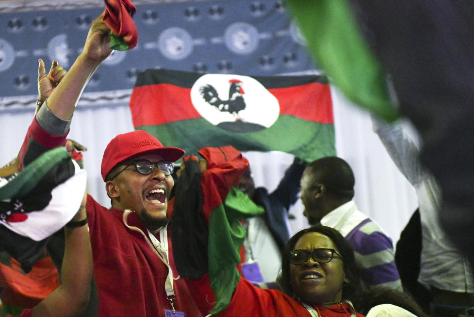 Malawi Congress Party supporters celebrate after party leader Lazarus Chakwera was announced the winner of Tuesday's election rerun in Blantyre, Malawi, Saturday, June 27, 2020. The opposition has won Malawi's historic rerun of the presidential election. It's the first time a court-overturned vote in Africa has led to the defeat of an incumbent leader (AP Photo/Thoko Chikondi)