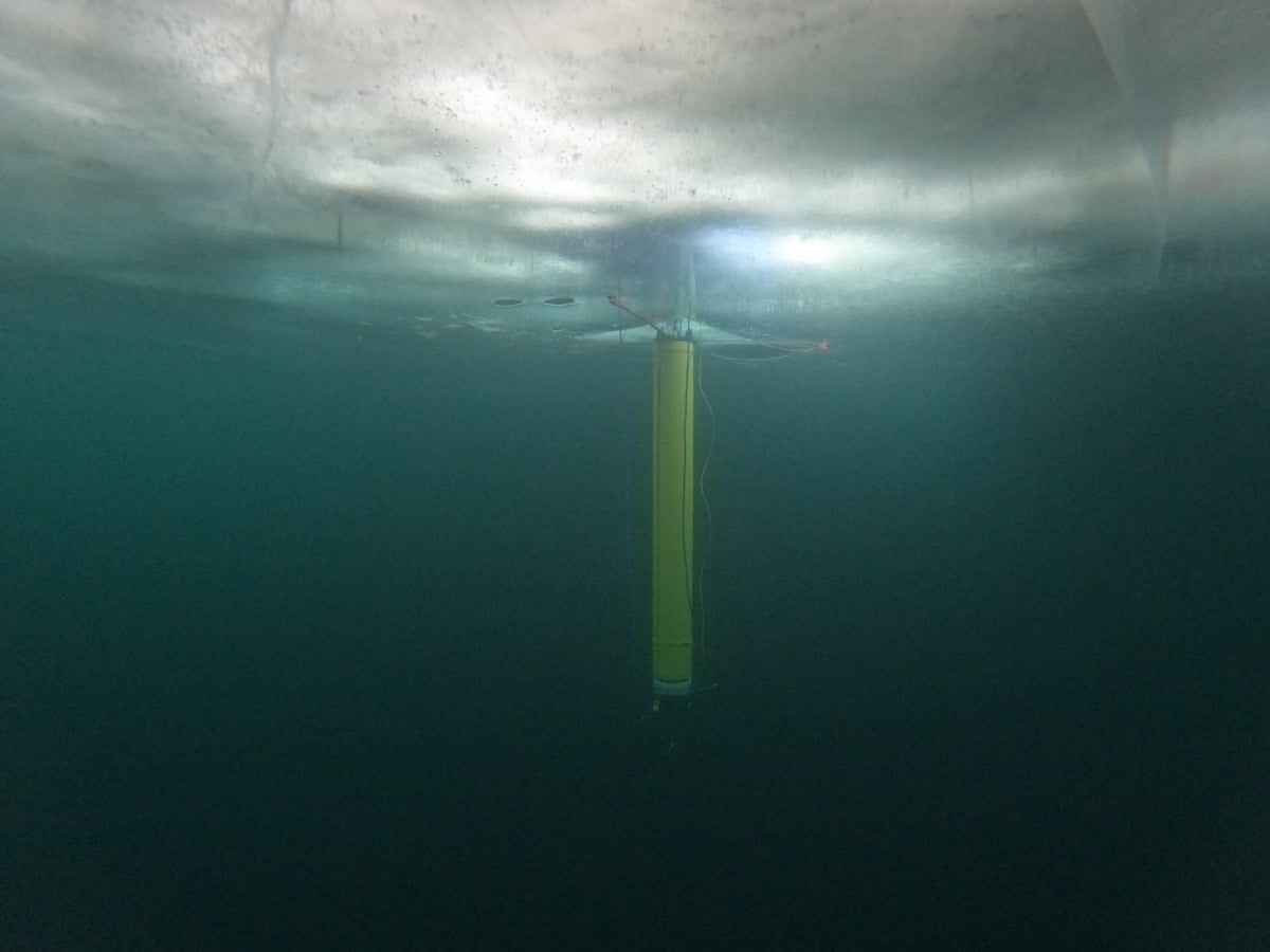 A prototype of an autonomous robot, part of a NASA project called IceNode, is seen in Lake Superior during a 2022 field test.  Scientists at the agency’s Jet Propulsion Laboratory are hoping to develop a fleet of these robots some day, to help better understand ice shelf melt rates. (NASA/JPL-Caltech)