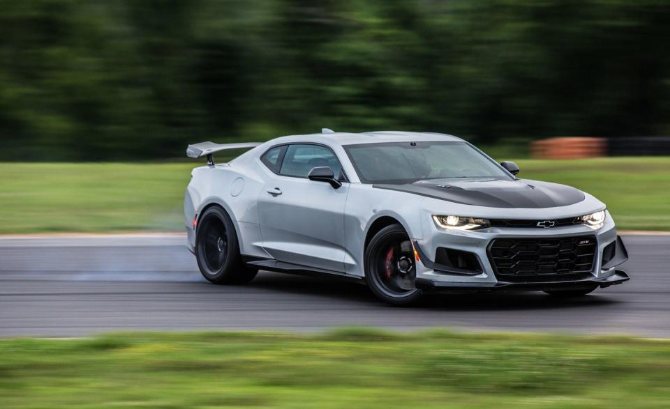 <p>Horsepower: 650; Weight: 3853 lb; Price as tested: $73,090<br><br></p><p>Lion tamers. That’s what we felt like after working the 3853-pound 650-hp Camaro ZL1 1LE to a 2:45.7 lap. The 1LE is a modified ZL1 designed for track use. It comes with spool-valve dampers in aluminum housings, steamroller Goodyear Eagle F1 Supercar 3R rubber, a wider mouth to better feed its 11 heat exchangers, dive planes that intimidate like face tattoos, and a carbon-fiber TV tray mounted to the trunklid. You need those parts. They’re the chair and whip necessary to keep this lion from eating you. <a rel="nofollow noopener" href="https://www.caranddriver.com/features/chevrolet-camaro-zl1-1le-at-lightning-lap-2017-feature" target="_blank" data-ylk="slk:READ MORE >>;elm:context_link;itc:0;sec:content-canvas" class="link ">READ MORE >></a></p>