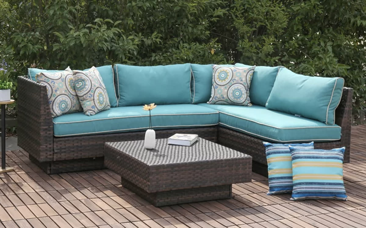 Outdoor sectional with blue cushions