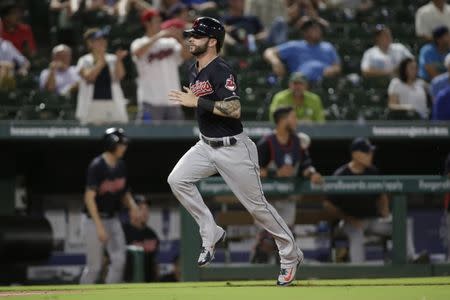 Jul 21, 2018; Arlington, TX, USA; Cleveland Indians center fielder Tyler Naquin (30) scores a run in the ninth inning against the Texas Rangers at Globe Life Park in Arlington. Mandatory Credit: Tim Heitman-USA TODAY Sports