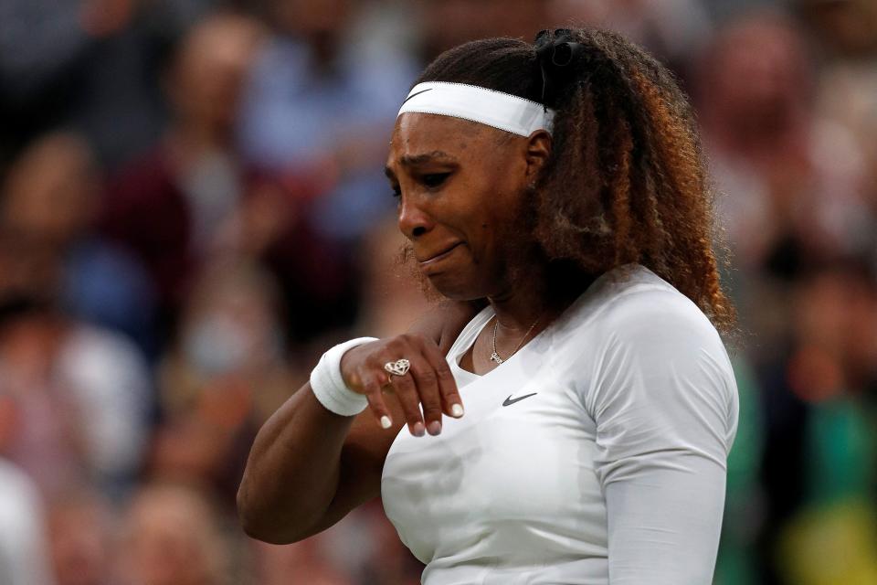 Serena Williams tears up as she withdraws from her first round match against Aliaksandra Sasnovich on the second day of Wimbledon. (Adrian Dennis/AFP via Getty Images)