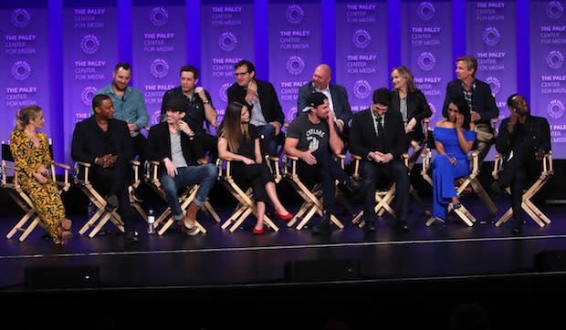 Guggenheim (back row, 3rd from right) with Arrowverse cast members circa 2017 (Getty Images) - Credit: Getty Images