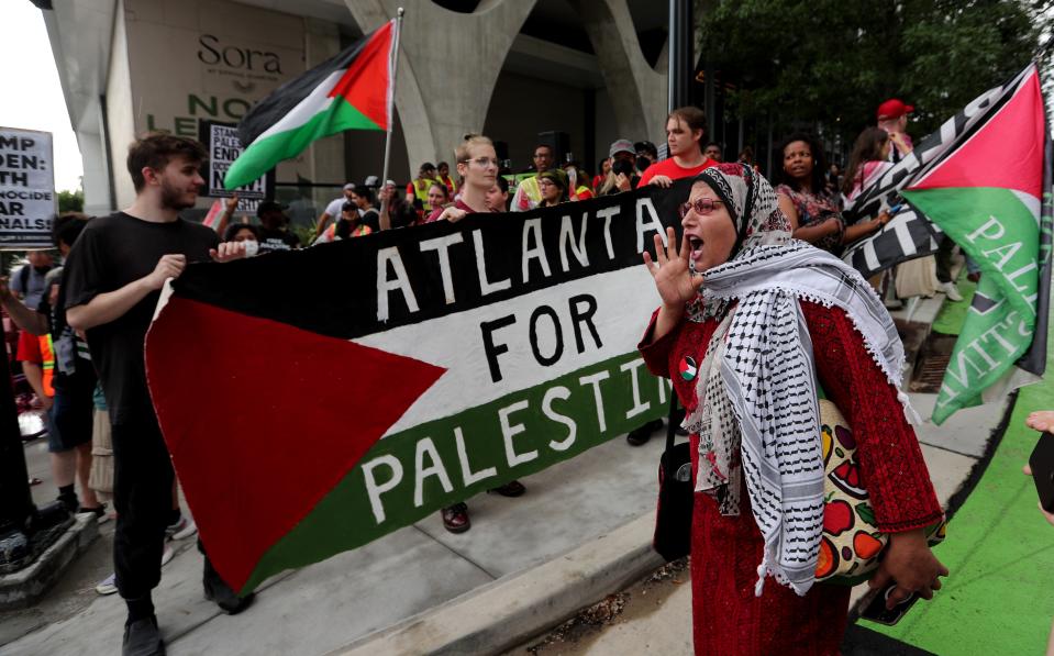 Pro-Palestinian supporters rally on the corner of Spring and 10th Street during the CNN Presidential Debate between President Joe Biden and former President Donald Trump held at CNN's studios in Atlanta.