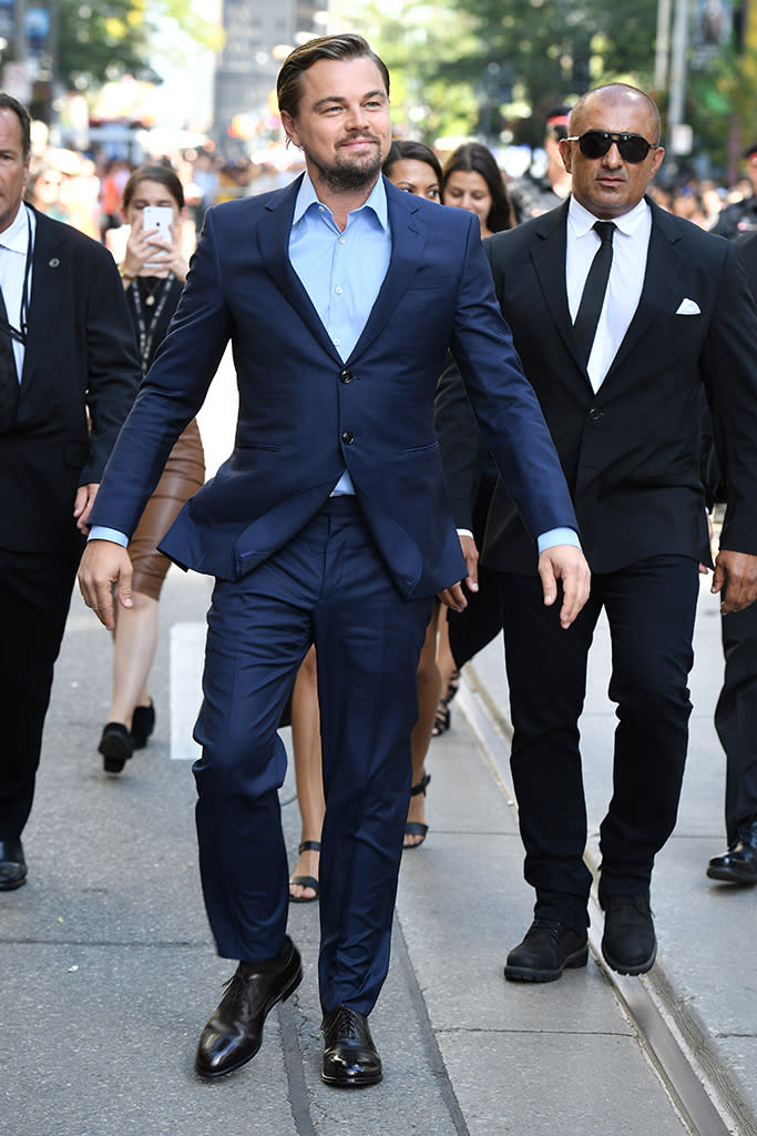 <p>Fred Astaire might have been known for being deft and light on his feet, but Leo is giving him a run for his money. Here, he doesn’t just walk down the street during the 2016 Toronto Film Festival, he <em>floats</em>. His jacket being slightly blown by the wind, his arms slightly uplifted, Leo appears to be taken with the whole experience, judging by the smile on his face, as he basks in the glow of a lighthearted walk in fall on foreign soil. It’s unclear if the wind is a natural phenomenon or self-generated by sheer force of will. (Photo: George Pimentel/WireImage) </p>