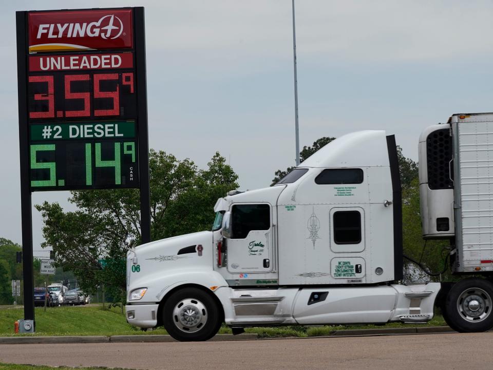 Truck passes  sign at Flying J Truck Stop in Pearl, Miss., Wednesday, April 20, 2022.