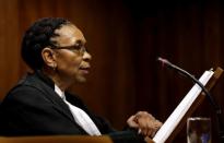 Judge Thokozile Masipa reads her verdict during an appeal hearing brought by prosecutors against the six-year jail term handed to Oscar Pistorius for the murder of his girlfriend Reeva Steenkamp in Johannesburg, South Africa, August 26, 2016. REUTERS/Themba Hadebe/Pool